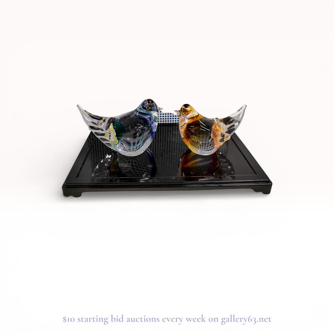 MultiGlass Murano Art Glass Bird Figurines: Authentic set of two MultiGlass art glass bird figurines, each formed in a rounded avian silhouette with outstretched wing detailing. The figures are executed in clear glass with internal color applic