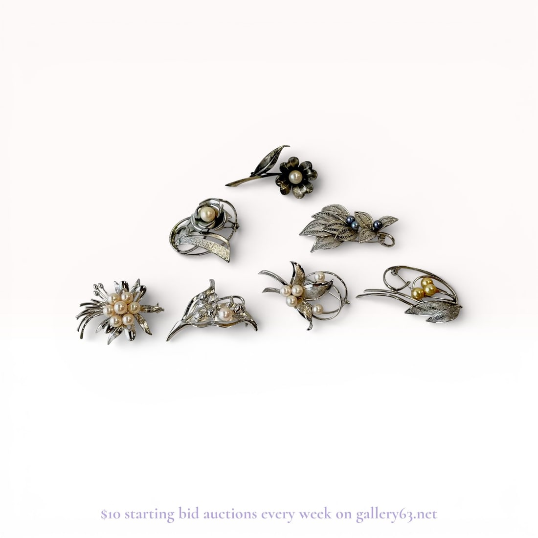 Vintage Pearl Brooch Lot – 7 Sterling Silver Pearl Pins Estate Jewelry Set: Estate lot offered as shown, including all items visible in the images. Offered as a single lot with no individual examination; contents and condition vary and may include wear, damage, or missing ele