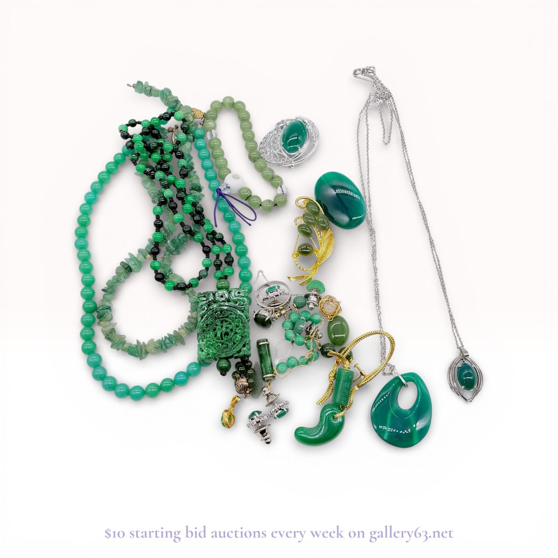 Jade Jewelry Accessories Lot – Green Stone Charms, Pendants, and Small Pieces: Estate lot offered as shown, including all items visible in the images. Offered as a single lot with no individual examination; contents and condition vary and may include wear, damage, or missing ele