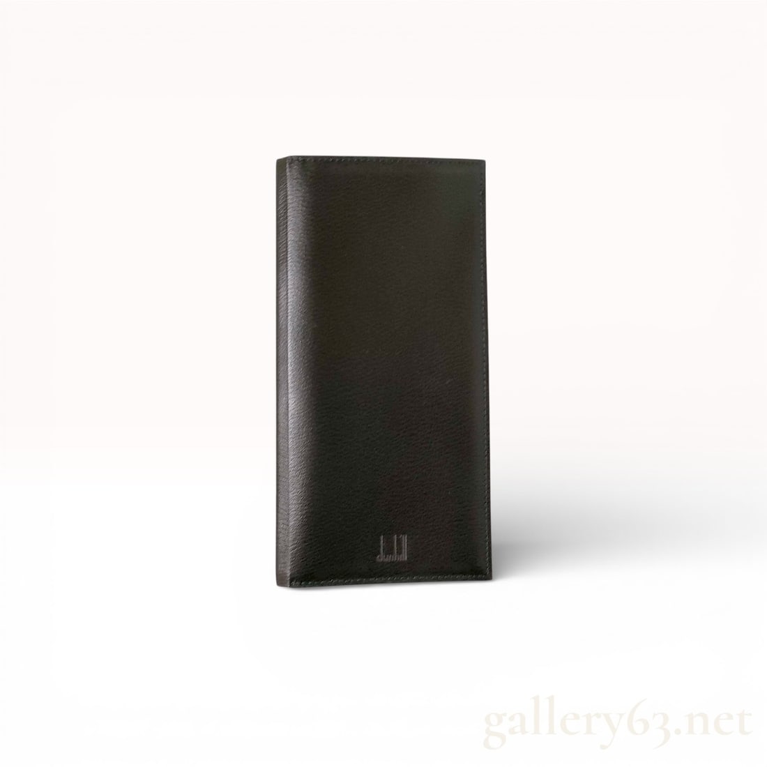 Dunhill Black Leather Long Bifold Wallet: Dunhill long wallet featuring black leather construction with a smooth finish. Design presenting a slim bifold silhouette with subtle embossed logo detailing. Interior featuring multiple card slot