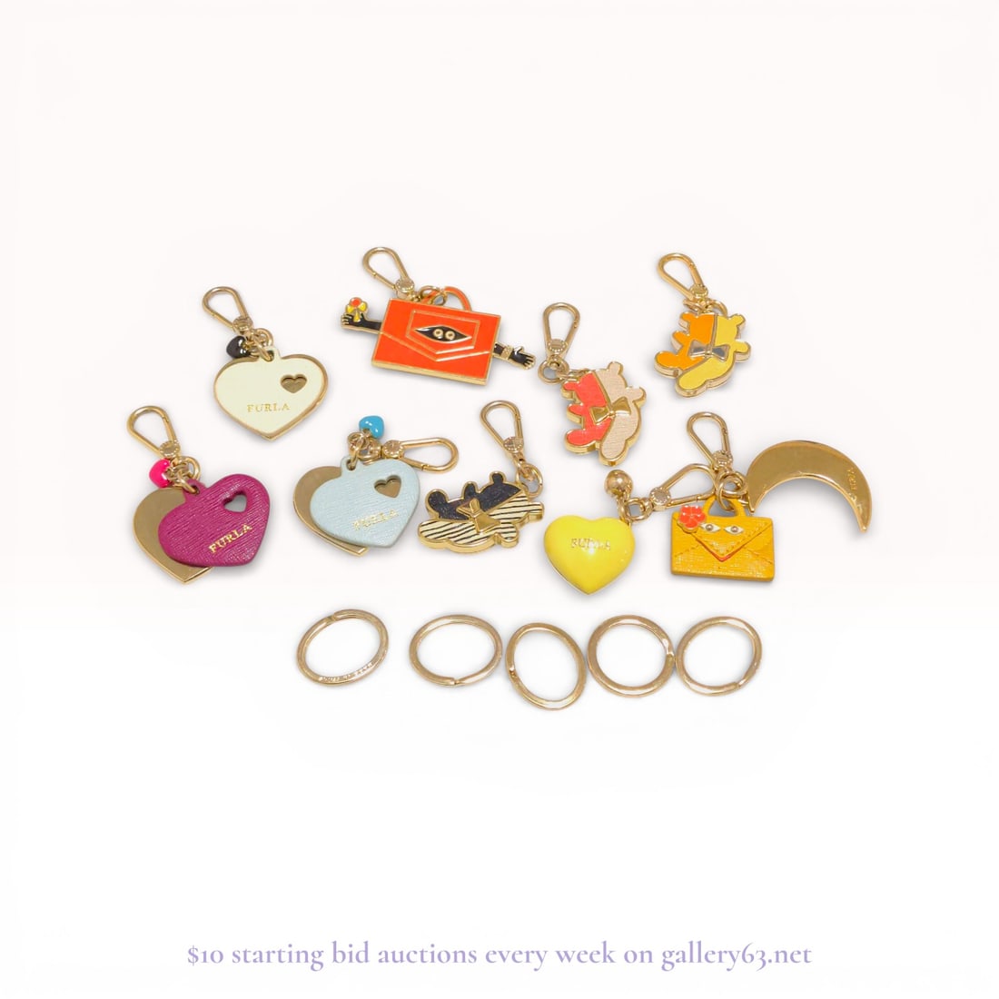 Furla Keychain & Charm Lot – Mixed Designer Accessories Estate Collection: Estate lot offered as shown, including all items visible in the images. Offered as a single lot with no individual examination; contents and condition vary and may include wear, damage, or missing ele