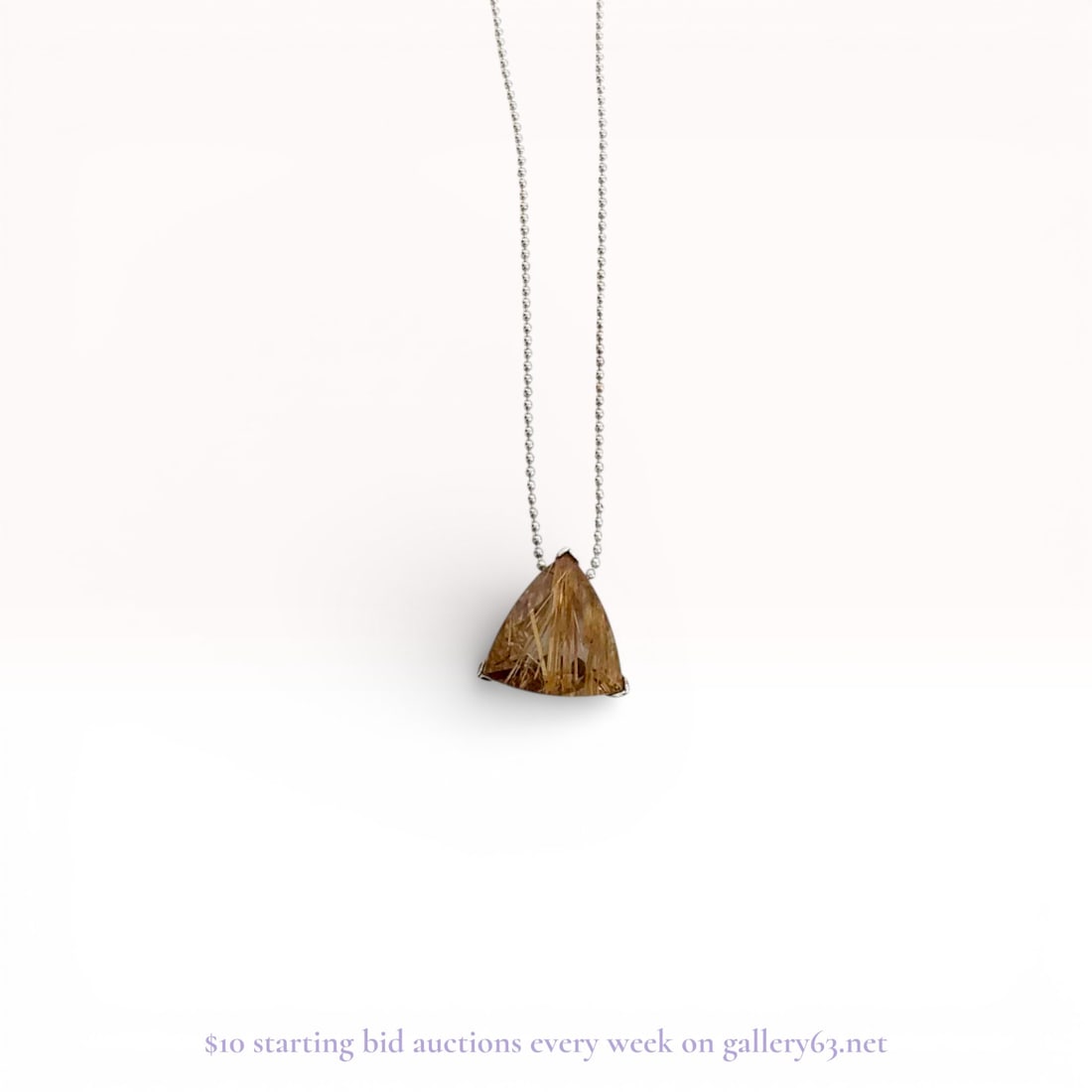 Sterling Silver Necklace with Rutilated Quartz Pendant – Estate Jewelry 8.8 grams: Estate lot offered as shown, including all items visible in the images. Offered as a single lot with no individual examination; contents and condition vary and may include wear, damage, or missing ele