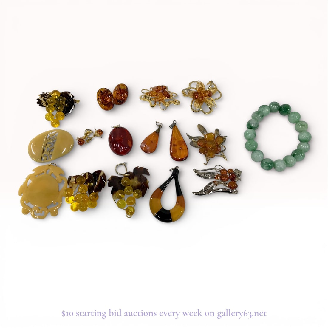 Vintage Jewelry Collection - Sterling Silver Brooch, Earrings and Jade Bracelet: Jewelry group made up of multiple brooches and earrings together with one beaded bracelet. Assortment featuring mixed metal finishes, including silver elements, and decorative components in amber-tone