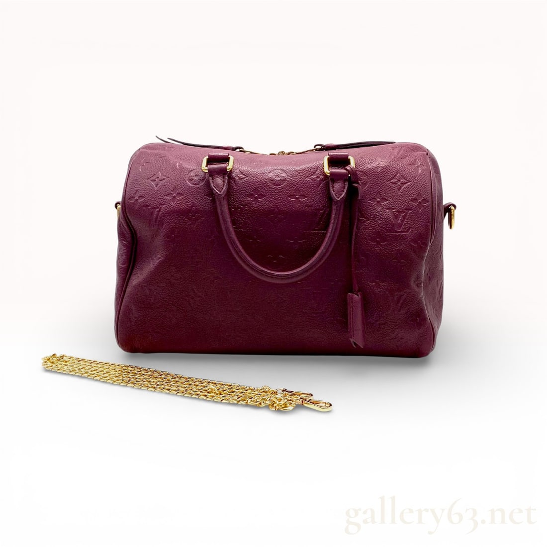 Louis Vuitton Monogram Empreinte Speedy Bandoulière 30 Purple Leather Satchel Bag Featuring: This Speedy Bandoulière is so luxe in Empreinte, especially in that deep purple (often called Aube or Prune depending on season). Louis Vuitton Speedy Bandoulière 30 satchel bag featuring monogram e