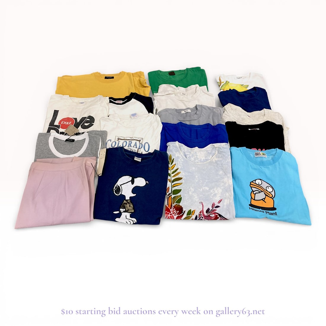 Vintage Shirt Collection Featuring Snoopy and Marvel Prints - Sizes Vary L-XL: Authentic vintage shirt collection. Multiple short-sleeve shirts in assorted sizes. Group featuring graphic prints including Snoopy character imagery and Marvel Comics motifs, along with additional pr