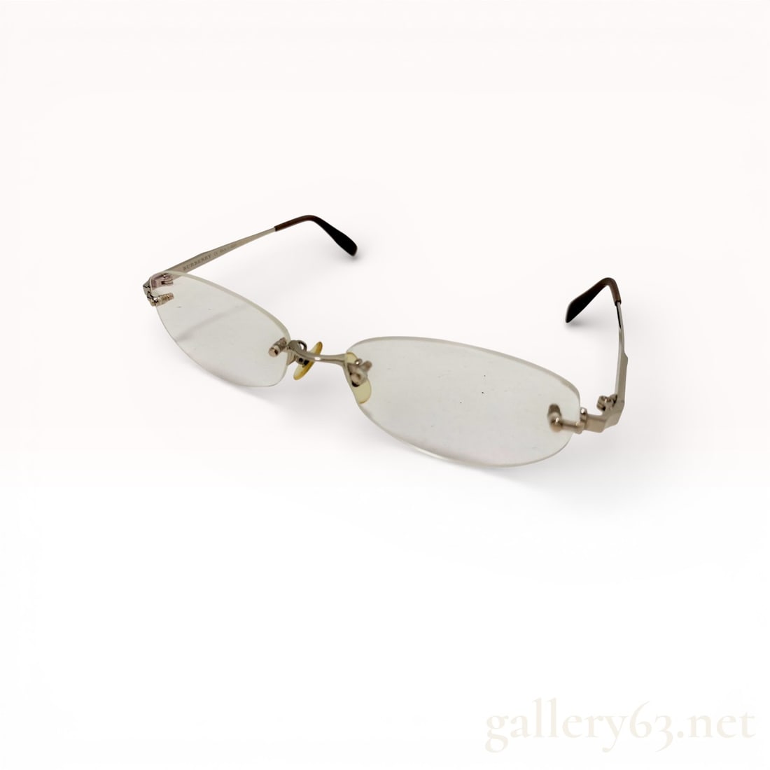 Burberry rimless eyeglasses with silver-tone metal bridge and temples (1 of 10)