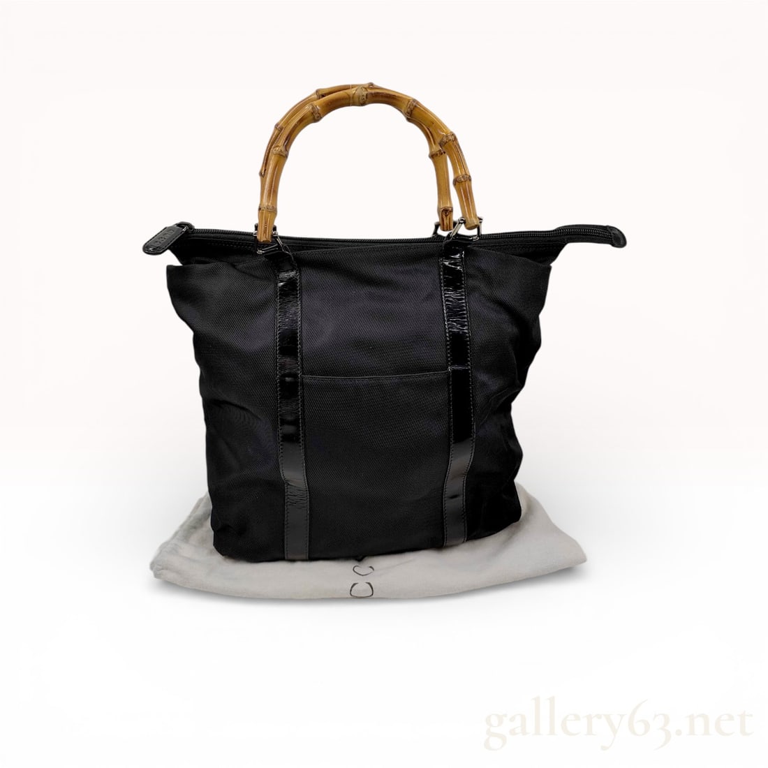Gucci Vintage Bamboo Top Handle Tote Bag: Authentic black nylon Gucci Vintage Bamboo Top Handle Tote Bag with black patent leather trim and silver-tone hardware.
