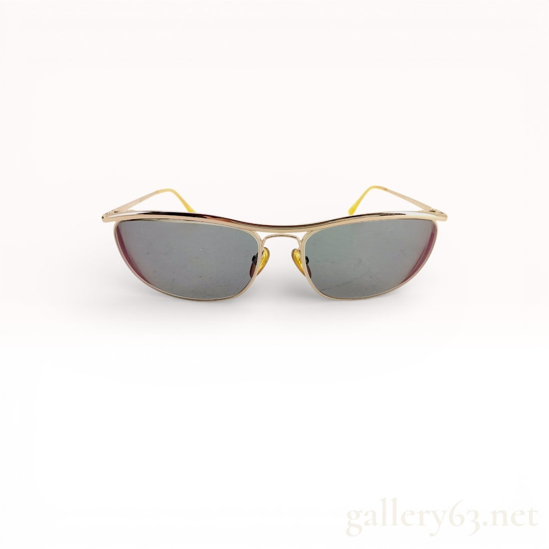 Tom Ford TF287 Silver Metal Sunglasses with Gray Lenses: tom ford sunglasses, authentic. model tf287. silver-tone metal frame with slim brow line and bridge. gray-tinted lenses in slightly curved rectangular shape. temples narrow with yellow plastic-coated