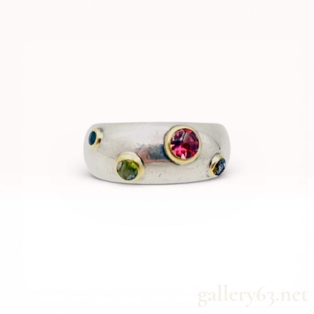 Tiffany & Co 2001 Etoile 18k Gold Silver Tanzanite Tourmaline Peridot Ring Band sz 6: Tiffany & Co 2001 Etoile 18k Gold Silver Tanzanite Tourmaline Peridot Ring Band. 16.2 grams total. Size 6 US 