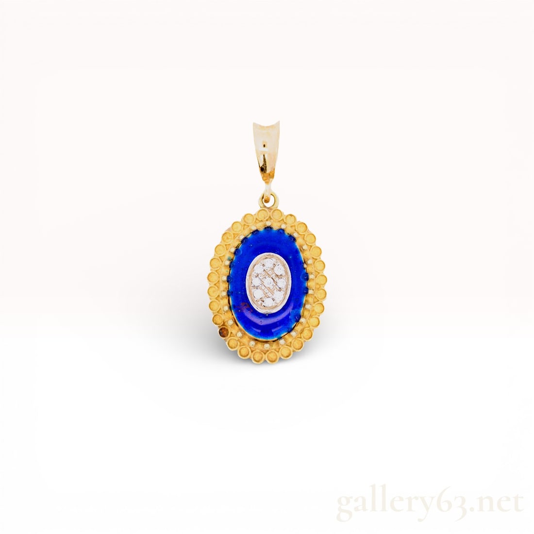 18KYG Vintage Enameled Oval Pendant w/ Diamonds: A vibrant heritage-style drop featuring deep cobalt enamel and a spark of diamonds, perfect for adding color to a classic yellow-gold chain or charm necklace. Finish Glossy royal-blue vitreous ename