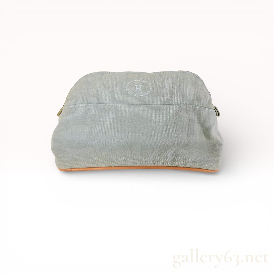 Hermès Toile Bolide Trousse de Voyage PM: Authentic Hermès Toile Bolide Trousse de Voyage PM in blue/seafoam cotton canvas with leather trim. 