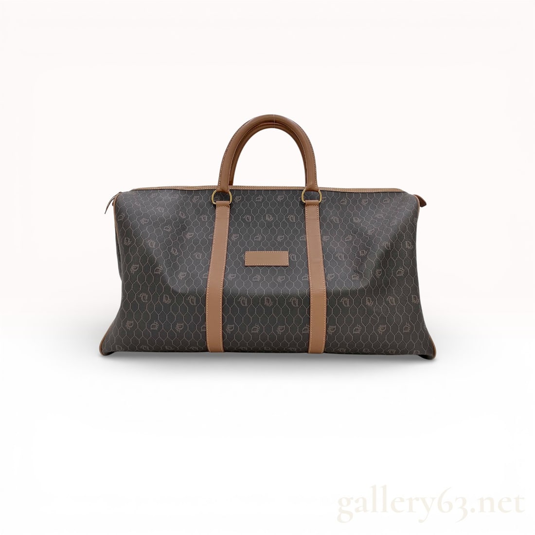 Dior Honeycomb Canvas Boston Bag with Cadena Lock and Keys: Boston bag having structured cylindrical form featuring dark honeycomb-pattern coated canvas. Bag having double rolled leather handles attached with gold-tone rings and leather trim running vertically