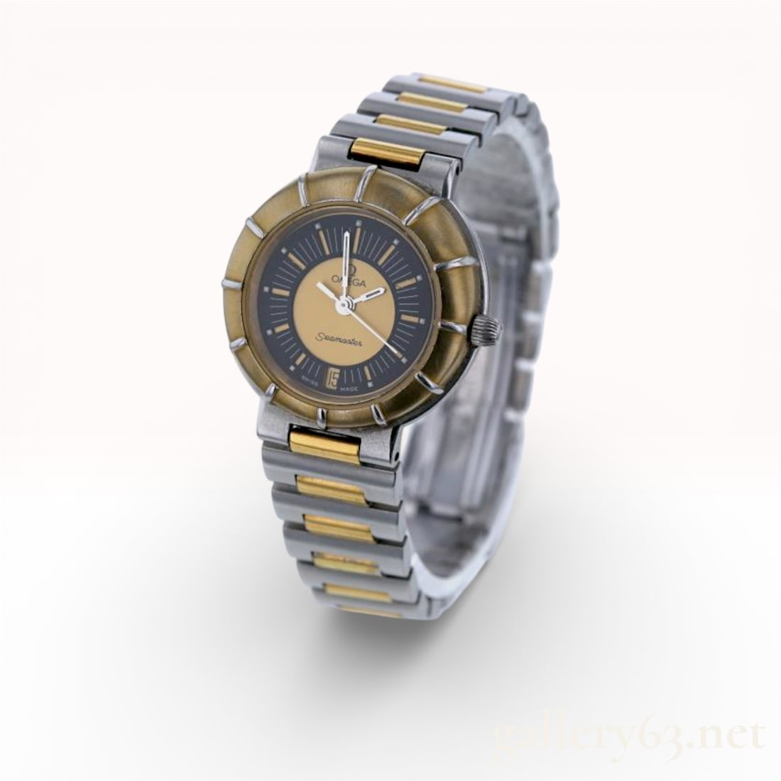 Authentic Omega Seamaster Dynamic Ladies Watch 22mm: Two-tone stainless and gold-tone design with striking black and yellow dial, date at 6 o’clock. Case shows moderate wear, crystal and bezel with visible scratches. Runs well. 22mm. 