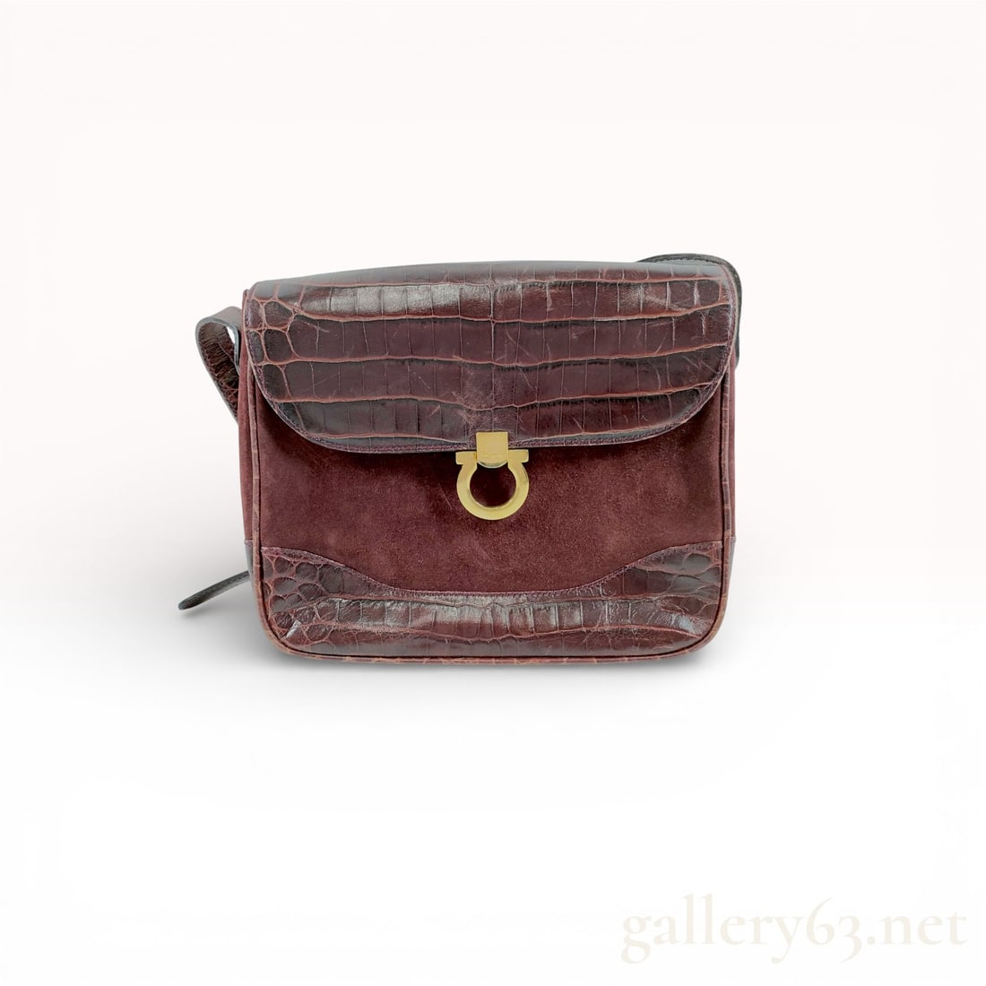 Salvatore Ferragamo Gancini Croc Leather Suede Shoulder Bag: Salvatore Ferragamo Gancini Croc Leather Suede Shoulder Bag. Shoulder bag in deep burgundy suede with croc leather trim. Rectangular flap-front silhouette. Gold-tone Gancini clasp at center.