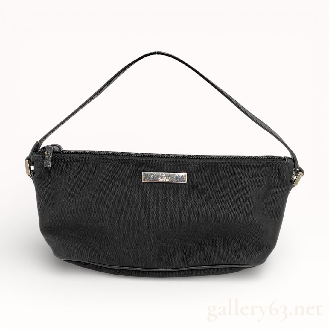 Gucci GG Canvas Accessory Pouch Shoulder Bag: Authentic Gucci accessory pouch crafted in black GG canvas having a compact, softly structured silhouette. Top featuring a zip closure with leather trim and metal zipper pull. Front set with a rectang