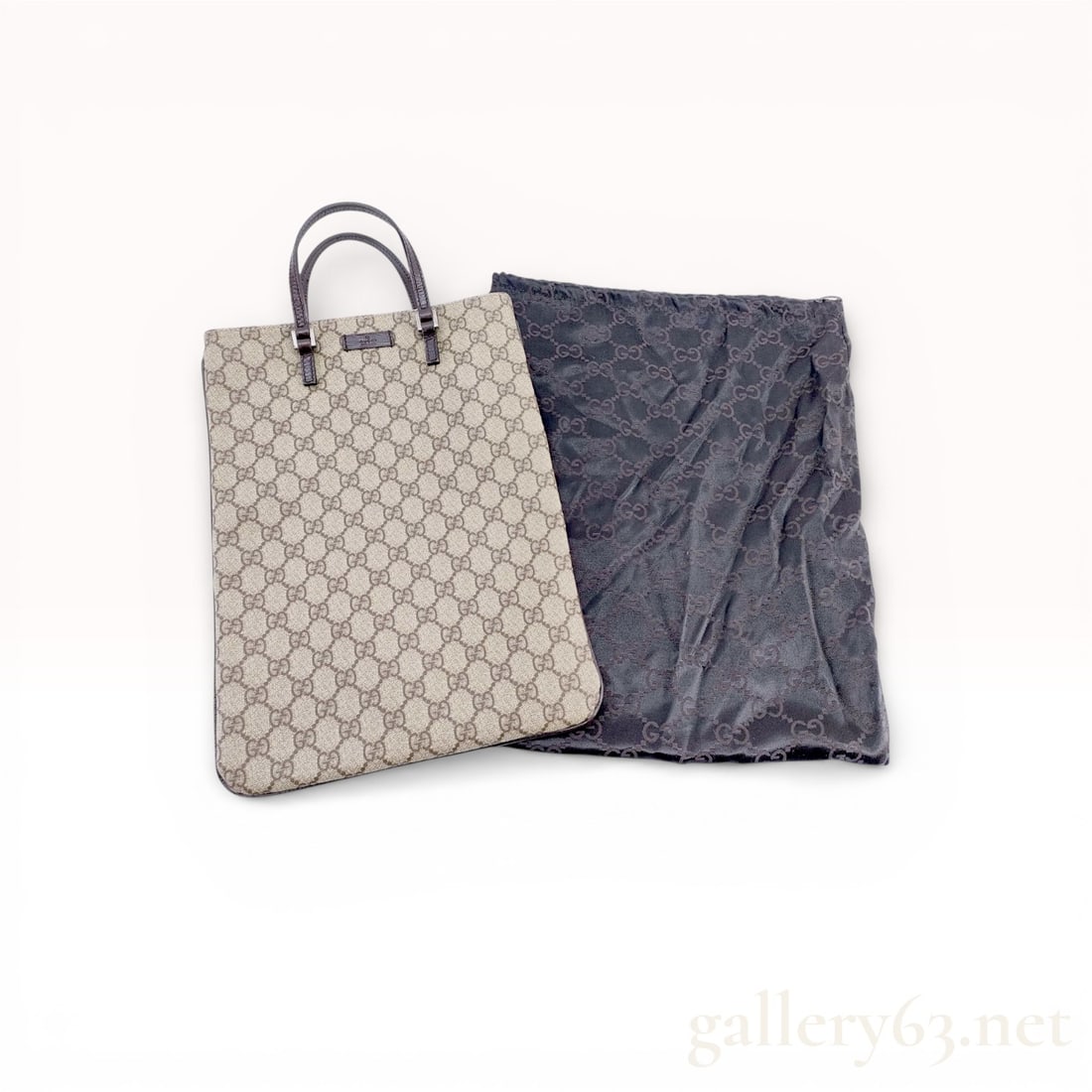 Gucci Original GG Supreme Vertical Tote in excellent condition: Authentic Gucci Original GG Supreme coated canvas vertical tote bag with brown leather trim. in excellent condition. with Gucci dust jacket.