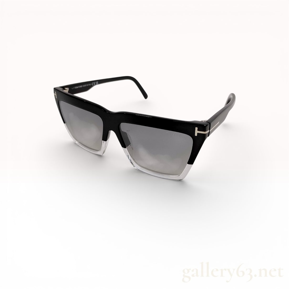 Tom Ford TF1110 Black and Clear Sunglasses with Gradient Lenses: Tom Ford TF1110 sunglasses having a rectangular frame in black acetate with clear lower rim detailing. Gray gradient lenses featuring darker tint at top fading lighter toward bottom. Temples in black