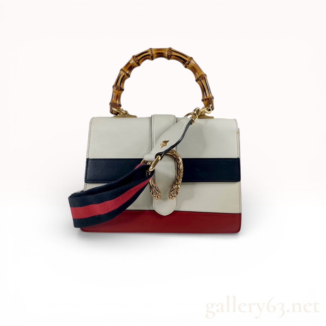 Gucci Bamboo Dionysus 2-Way Handbag: Authentic Gucci Bamboo Dionysus 2-Way Handbag featuring white leather with navy and red center stripes across the front. Designed with a bamboo top handle and the signature Dionysus textured horseshoe