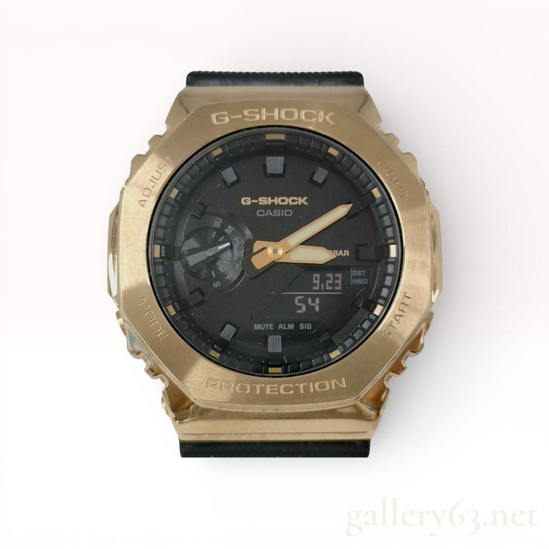 Casio G-Shock GM-2100G Analog-Digital Watch 44 mm gold tone: 44mm Casio g-shock with gold-tone stainless steel bezel with black dial and resin band. Includes analog-digital display, stopwatch, countdown timer, alarm, LED light, and 200M water resistance.