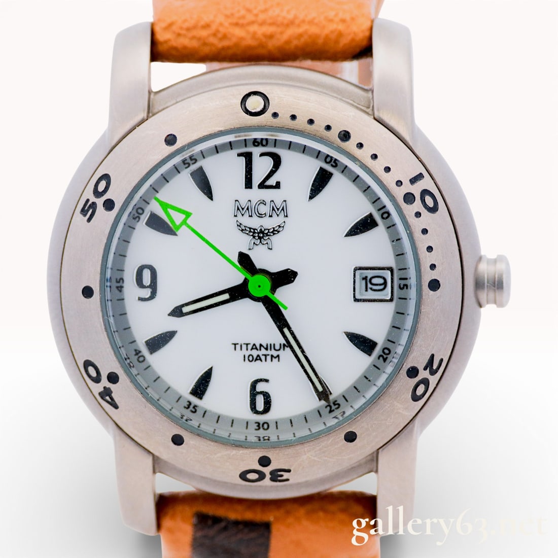 Titanium MCM Quartz & Leather Watch 28mm Case: Titanium MCM Quartz & Leather Watch 28mm case size. Comes in original box with papers. 