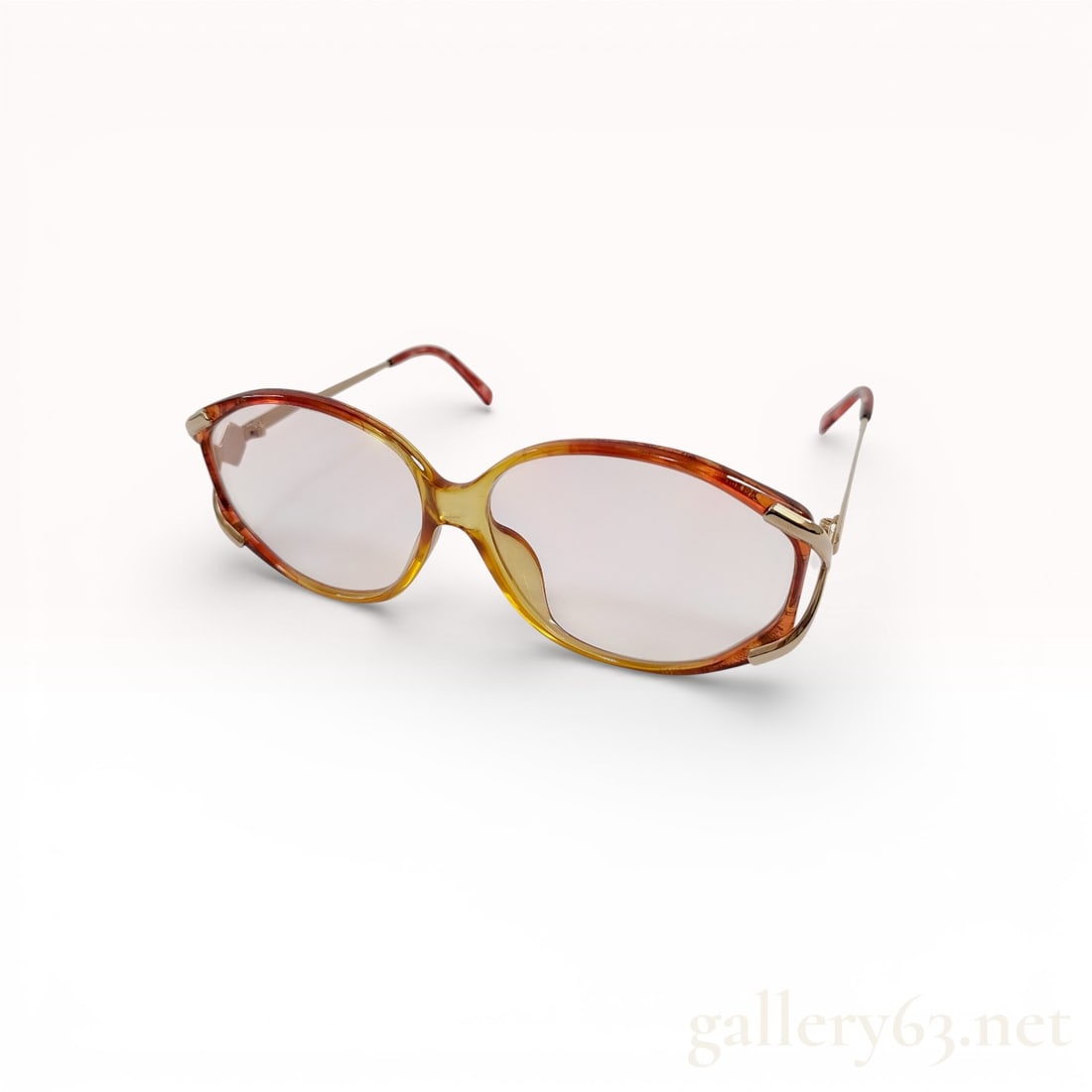 Christian Dior oversized glasses with an amber orange lucite frame and gold details: Authentic pair of vintage Christian Dior oversized glasses with an amber orange lucite frame and gold details