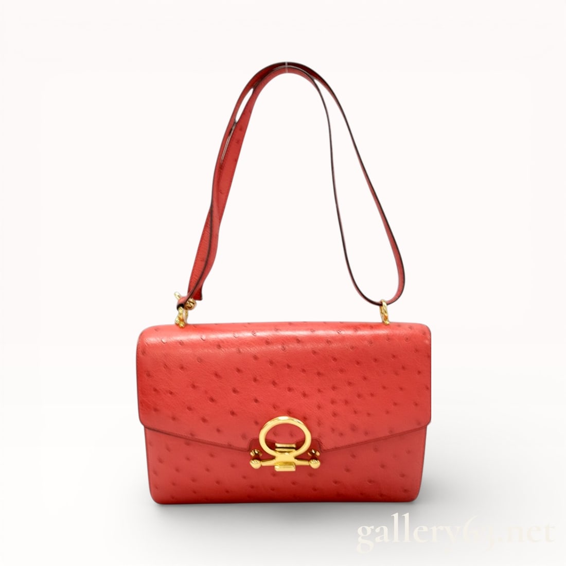 Authentic Hermès Vintage Sequana Ostrich Leather Handbag: Authentic Vintage Hermès Sequana handbag crafted in apple red ostrich leather, displaying the characteristic quill pattern throughout. Compact structured silhouette with a front flap secured by a
