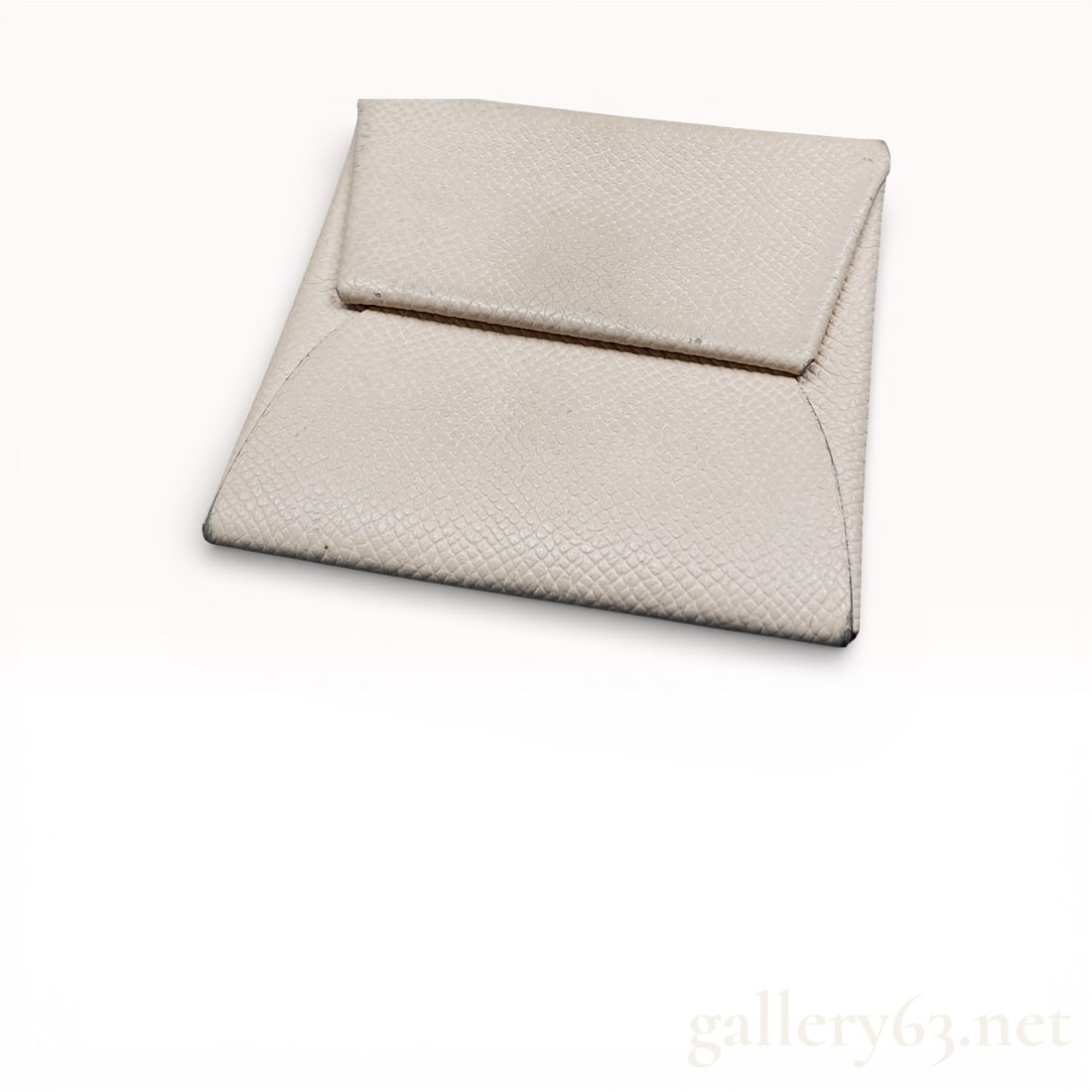 Hermes Bastia Leather Coin Purse: Hermes Bastia Leather Coin Purse in preowned condition. Look at the pictures and make your own decisions. Its not brand new, its a coin purse so it has seen some use. But it is in pretty decent condit