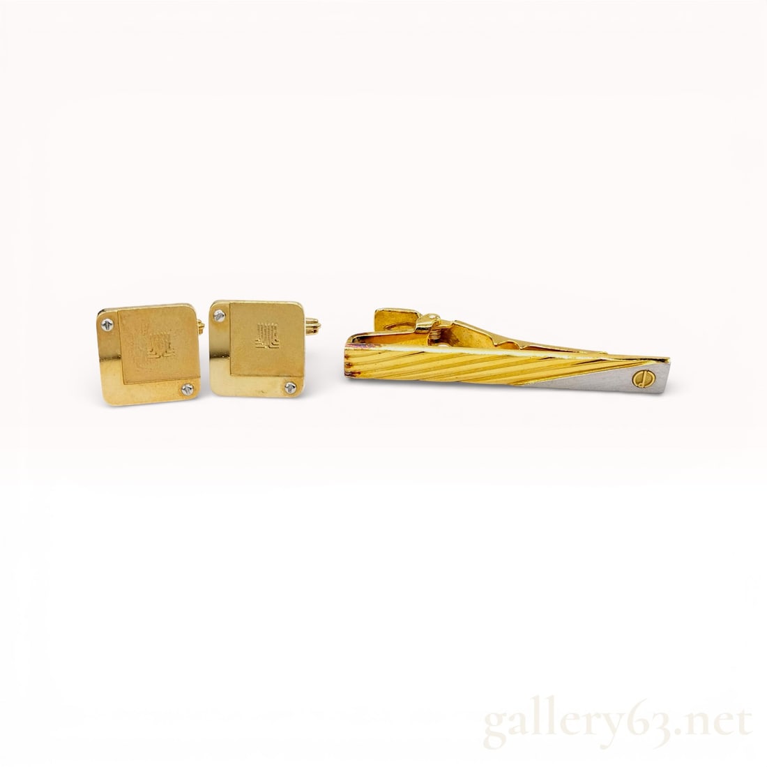 Dunhill Gold-Tone Tie Bar and Square Cufflinks Set with Logo and Diagonal Detail: Dunhill accessory set crafted in gold-tone metal, comprising a tie bar and a pair of cufflinks. Cufflinks designed in square form featuring brushed centers and polished borders, each accented wit