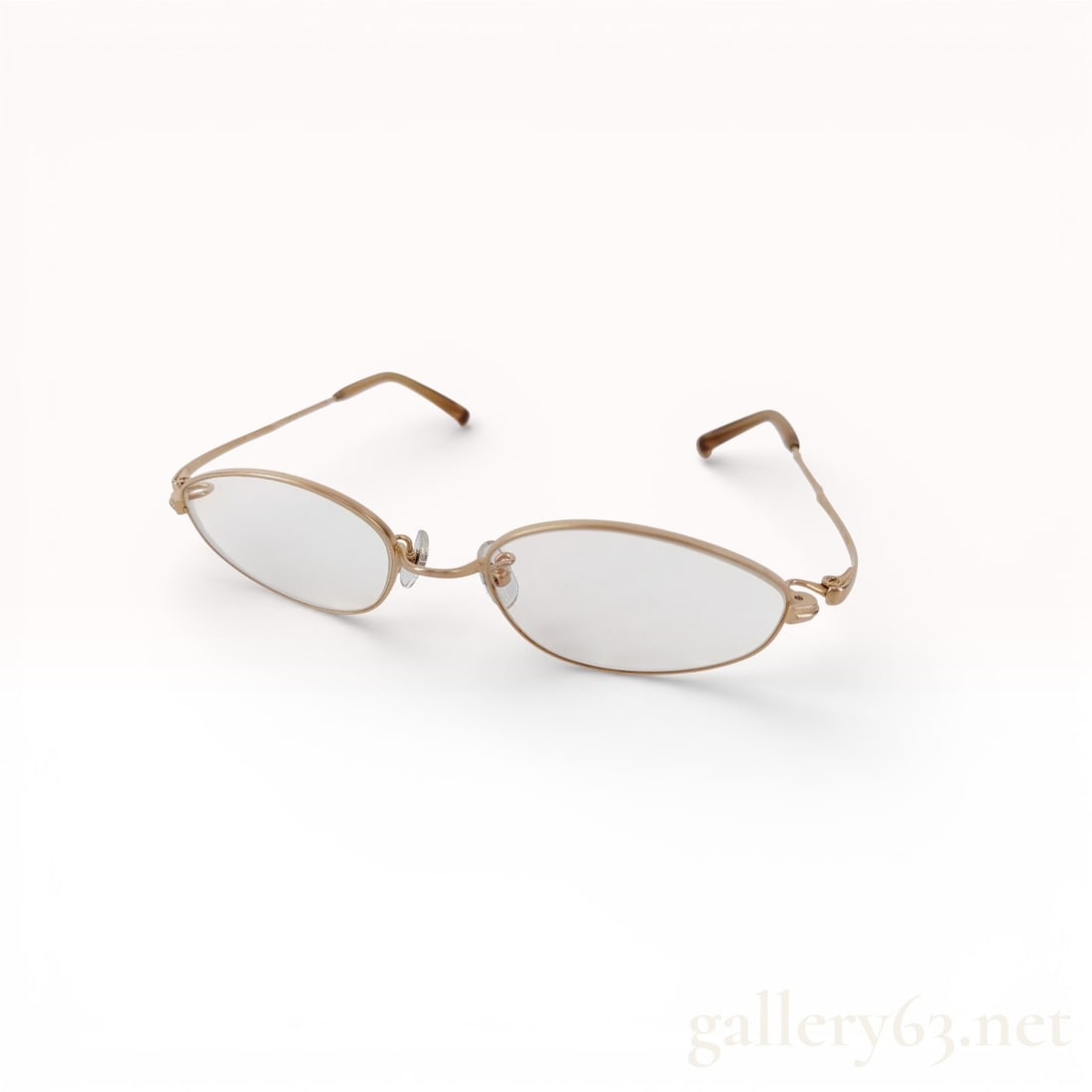 999.9 Four Nines Oval Eyeglasses in Gold-Tone Metal with Clear Lenses (1 of 10)