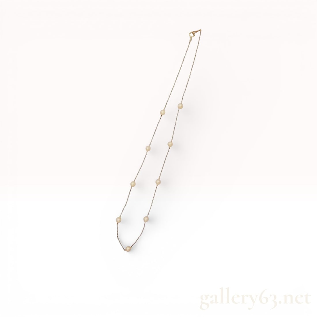 18K Yellow Gold Station Pearl Necklace, 4.7–4.9mm Pearls: 18K yellow gold station necklace featuring evenly spaced round pearls measuring approximately 4.7–4.9mm in diameter. Designed in a delicate chain style with pearls set at intervals along the l