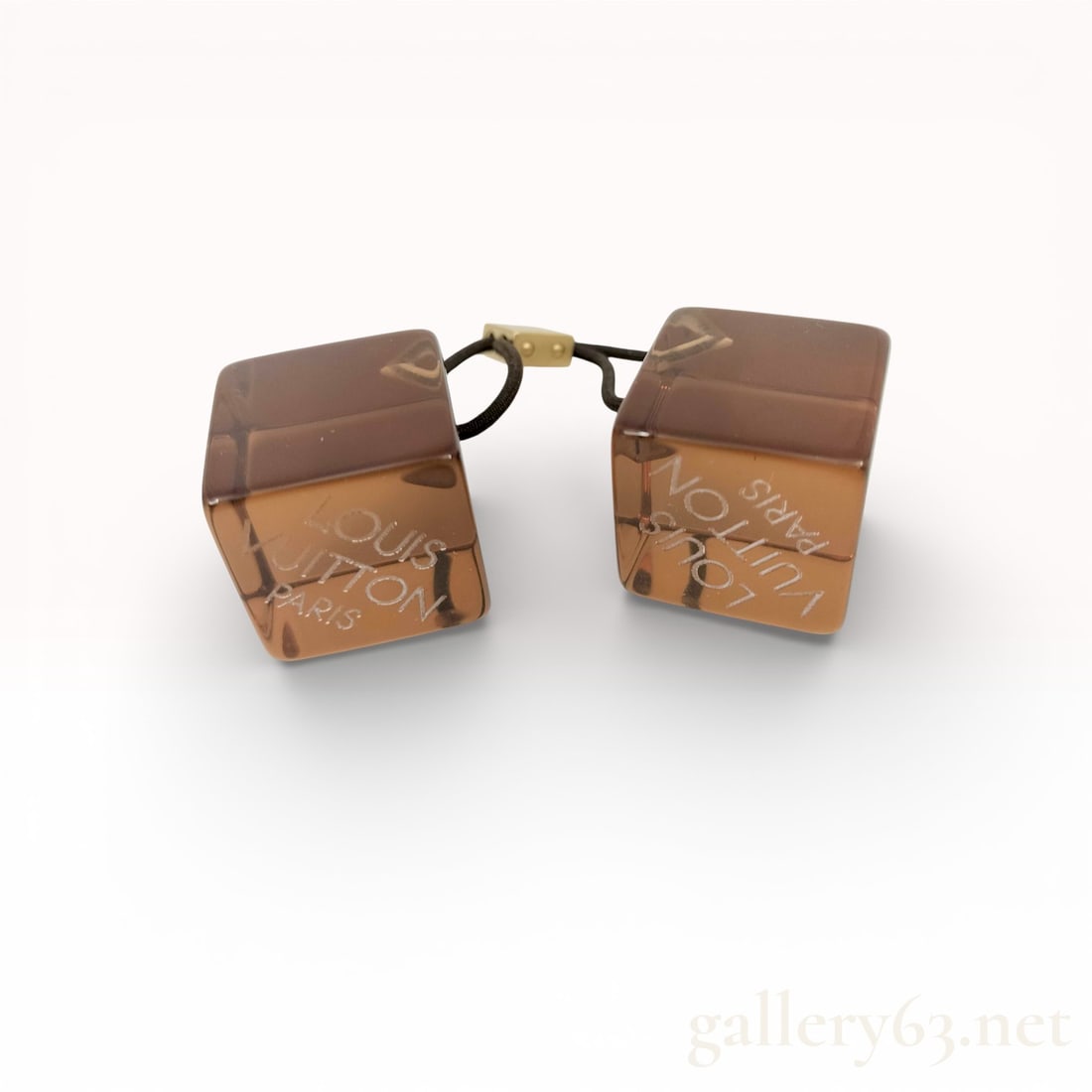 Louis Vuitton Dice Hair Cube Monogram Hair Tie in Chocolate Brown: Louis Vuitton Hair Cube accessory, specifically the resin and elastic style in a chocolate brown color. 