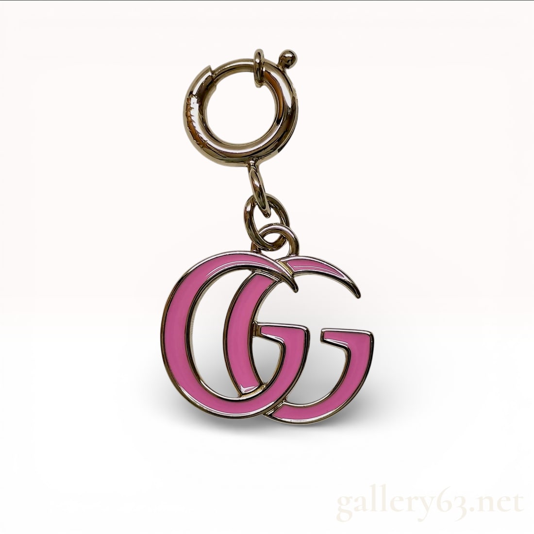 Gucci Double G Pink Enamel Bag Charm with Box - Brand New: Gucci bag charm featuring the Double G motif in pink enamel set within gold-tone hardware. Having a spring ring clasp for attachment to a handbag or keys and a compact, lightweight silhouette. Designe