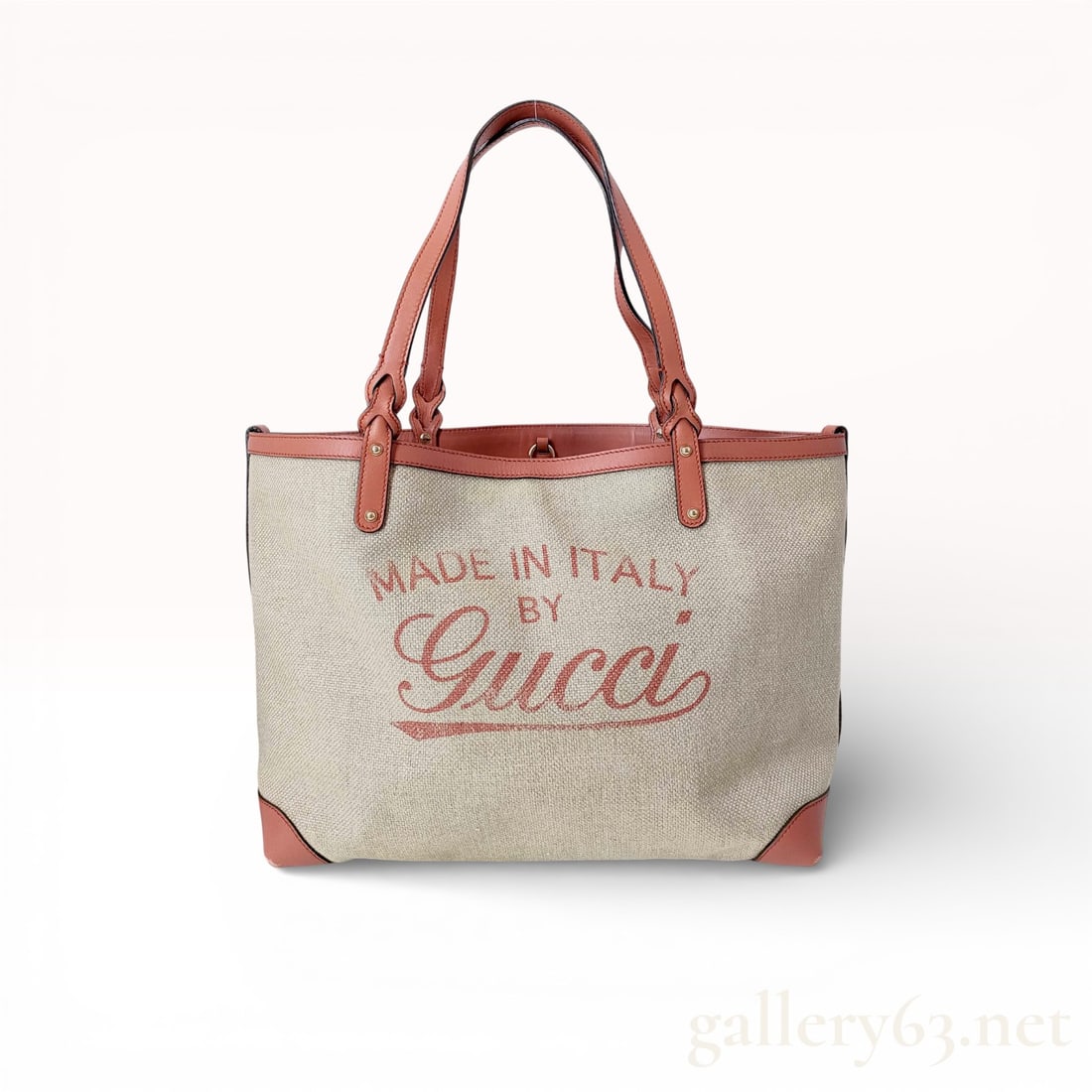 Gucci Craft Canvas & Pink Leather Tote Bag with Braided Handles: Authentic Gucci Craft Canvas Tote Bag featuring natural canvas with pink leather trim and braided leather handles. Excellent condition. Accompanied by dust jacket. 35 cm / 14 inches base length. 