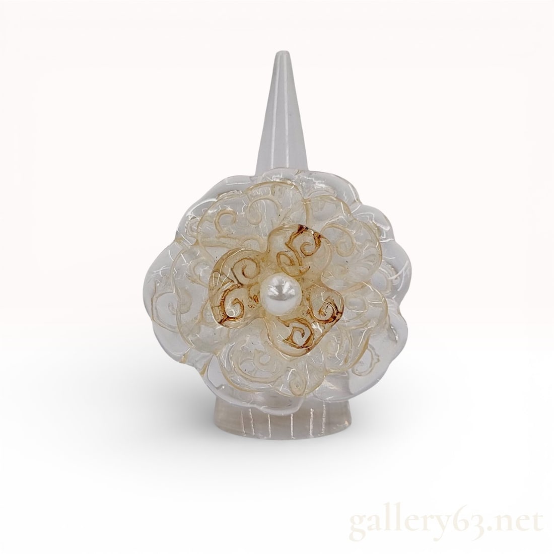 Chanel Camélia Ring, Size 7: Authentic Chanel ring featuring the signature Camélia flower motif, executed in translucent resin with sculpted petal detailing. The floral form centers around a pearl accent, creating a dimensional,