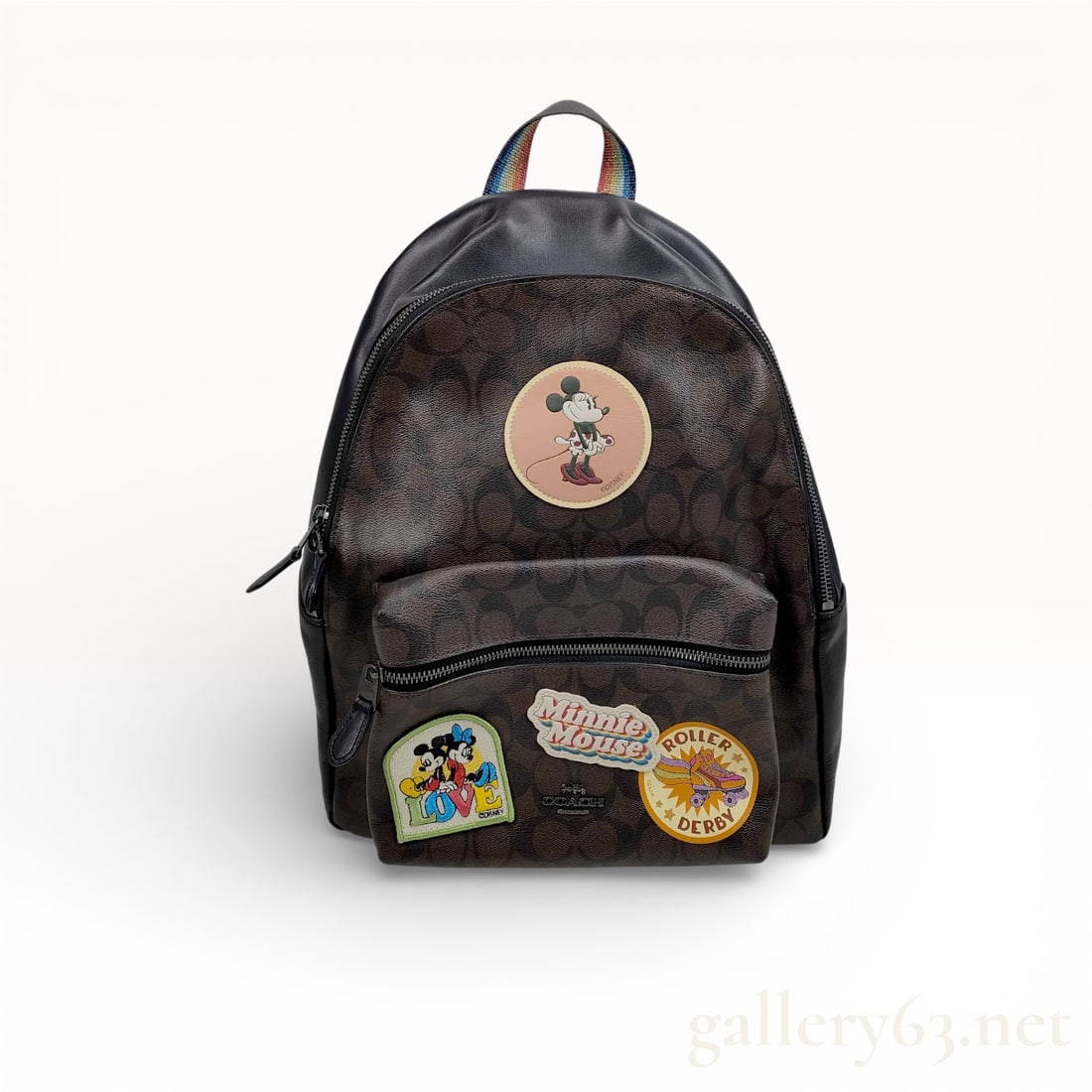 Coach Signature F29355 Disney Collaboration Backpack Rucksack with Mickey Mouse Patches: Coach Signature backpack style F29355 from the Disney collaboration collection. Crafted in brown signature coated canvas with black leather trim. Features Mickey Mouse graphic patch at front and addit