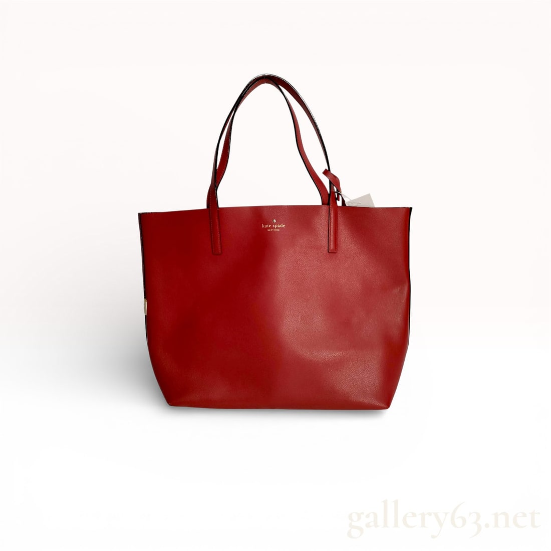 Kate Spade New York Mya Reversible Tote in red leather / rose with Pouch: Authentic Kate Spade New York Mya Reversible Tote in red leather. Yes, this is reversible! and it comes with the matching pouch. Open -top style tote with two handles that can go over the shoulder. Ex