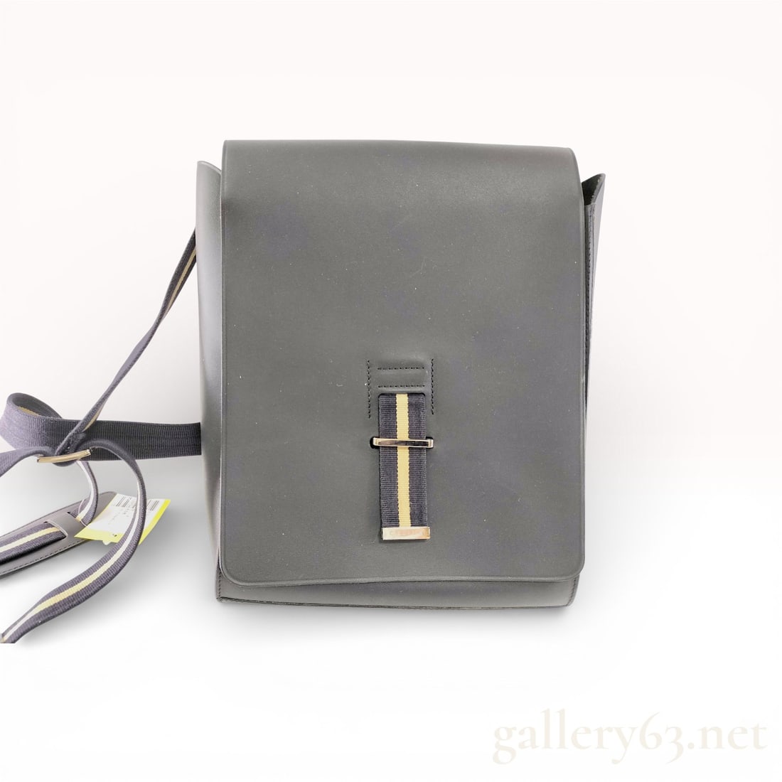 Celine Leather Shoulder Bag: Authentic Céline shoulder bag in black smooth leather, featuring a structured rectangular silhouette with full front flap. The front is accented by a vertical web stripe detail secured with silver