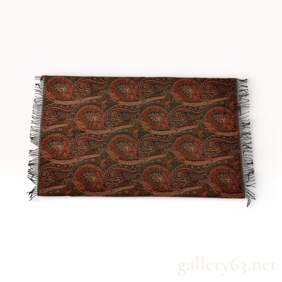 Etro Paisley Wool Blend Shawl Wrap Scarf with Fringe Trim: Etro wrap featuring an allover paisley motif in shades of brown, rust, green, and muted gold. Rectangular woven construction finished with short fringe trim along both ends. Pattern displays clas