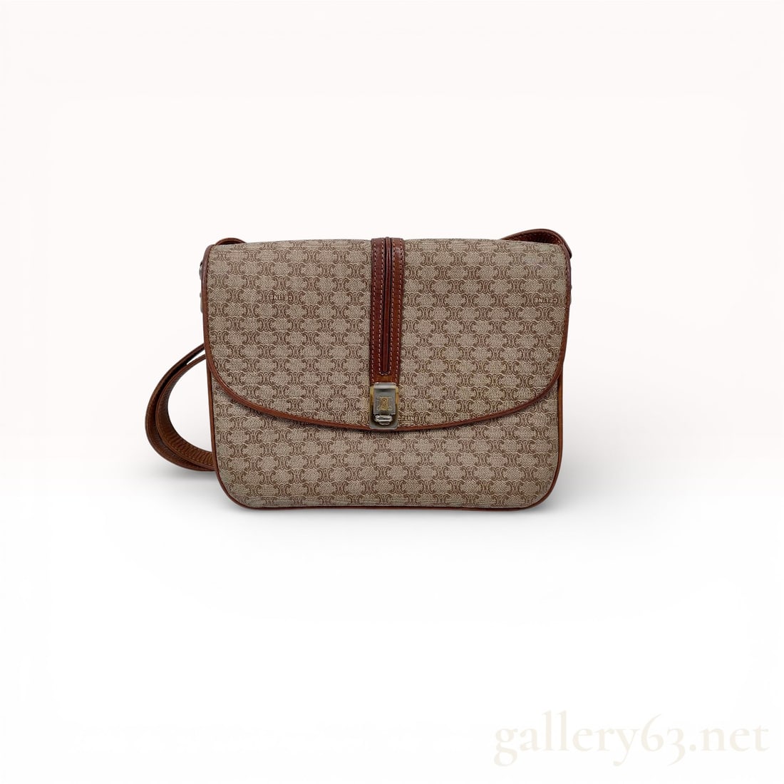 Celine Macadam Shoulder Bag: Authentic Céline shoulder bag in beige coated canvas featuring the Macadam monogram pattern throughout. The structured silhouette is trimmed in brown leather with coordinating piping and vertical cen