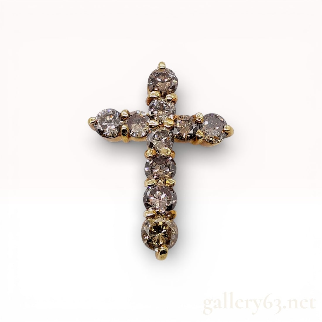 18k Yellow Gold 1.00ct Diamond Cross Pendant: \18k yellow gold pendant top featuring a cross motif set with round-cut diamonds. Design displaying a continuous line of prong-set stones forming the vertical and horizontal arms. Pendant top fitted w