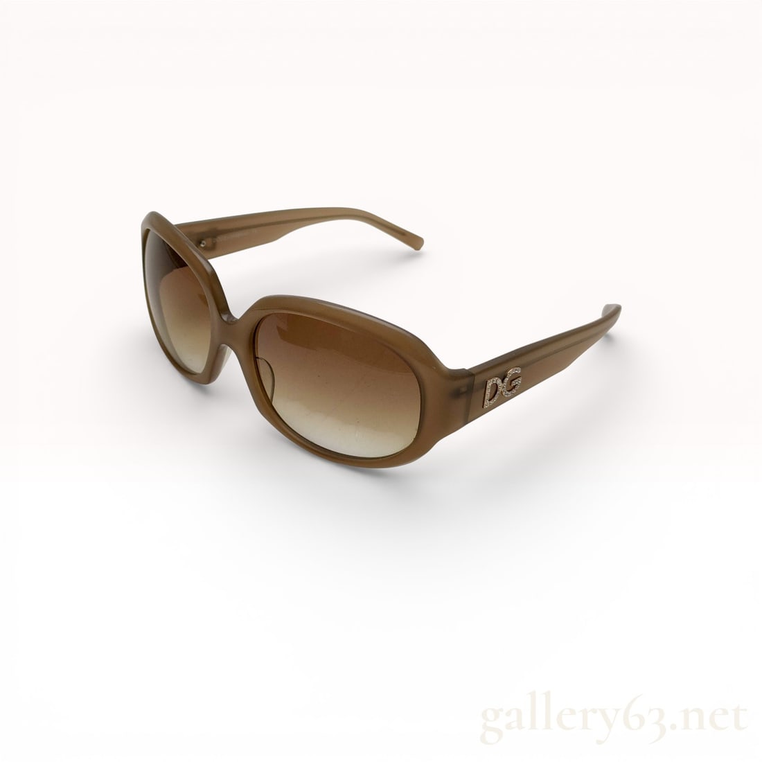 Dolce & Gabbana Brown Oversized Sunglasses with Gradient Lenses and D&G Logo Temples with case: Dolce & Gabbana sunglasses featuring an oversized brown acetate frame. Sunglasses designed with softly rounded rectangular lenses in a gradient tint. Frame detailed with sculpted arms and sil