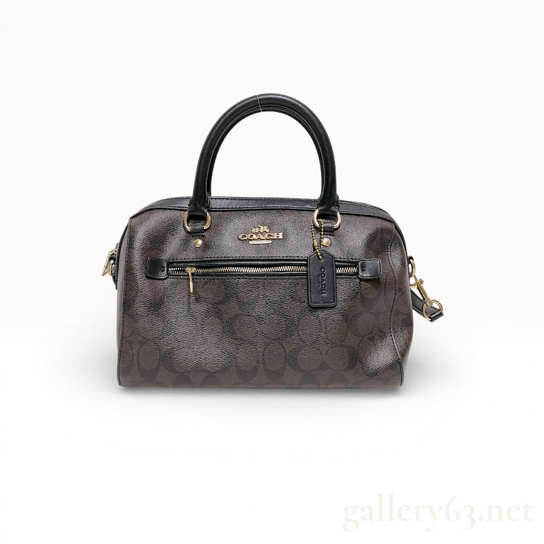 Coach Rowan 2-Way Satchel in Signature Canvas & Leather (style F83607): Authentic Coach Rowan Satchel in Signature Canvas & Leather (style F83607). Chocolate brown & black signature canvas, complimentary soft gold hardware. Bag's got four feet which is always grea