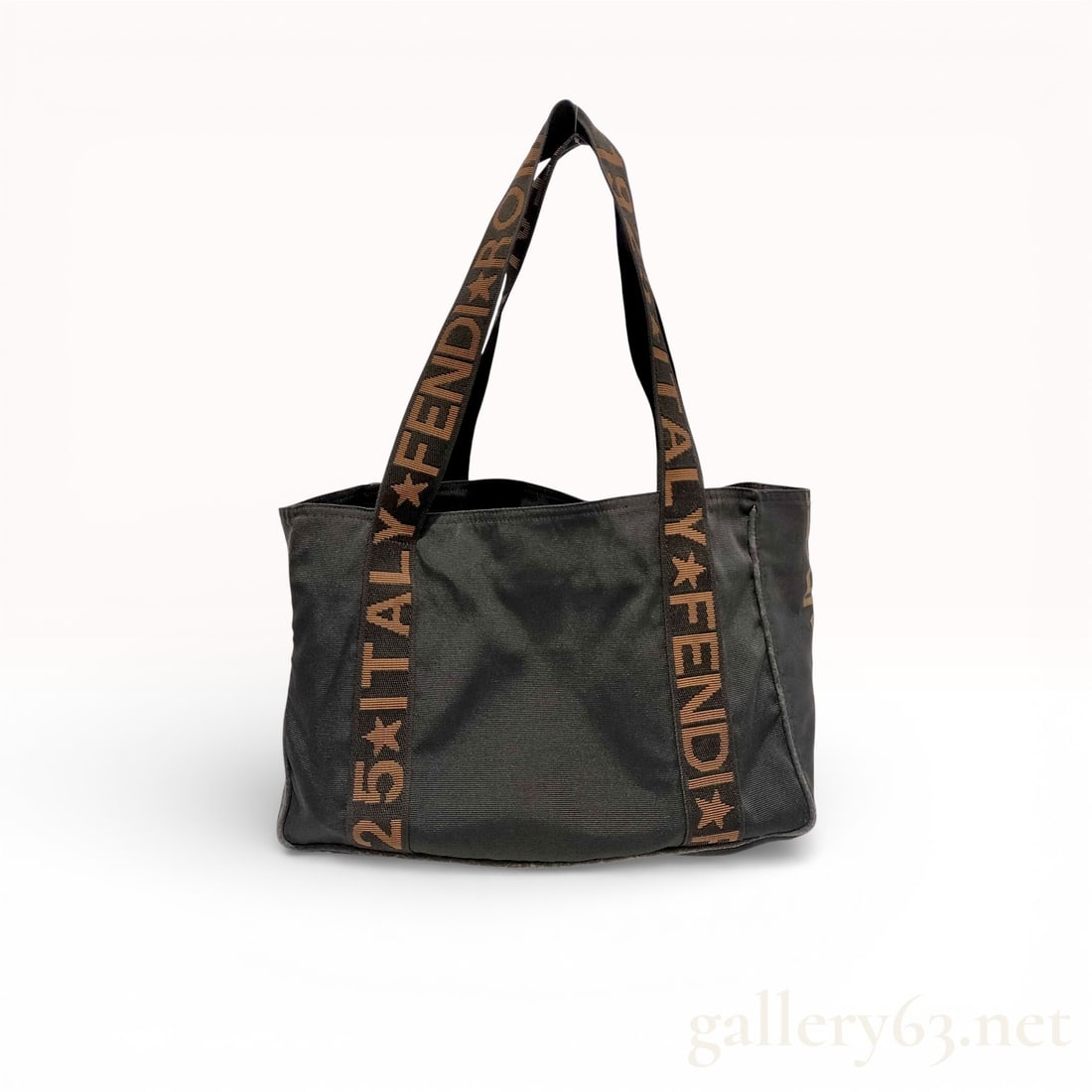 Vintage Fendi Roma Star Black Canvas Tote Bag: Authentic Fendi vintage Roma Star tote bag in black canvas, featuring a soft rectangular silhouette with contrast logo web shoulder straps. The straps are woven with “FENDI, ” “ROMA, ”