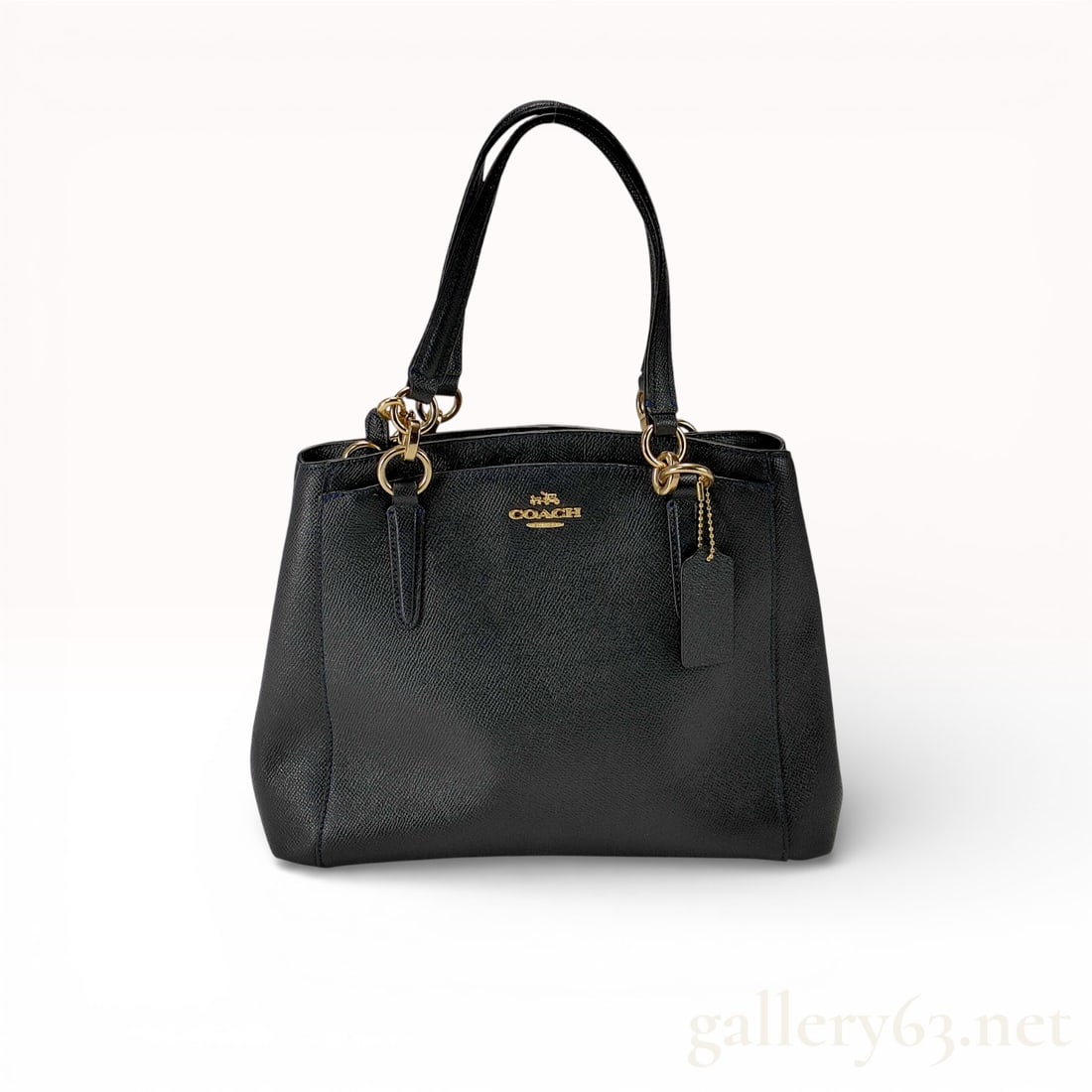 Coach F57847 Black Pebbled Leather 2-Way Satchel Handbag with Gold-Tone Hardware: Coach handbag style F57847 crafted in black pebbled leather featuring a structured satchel silhouette. Designed with dual top handles, open interior compartments, and gold-tone hardware accents. Hangi