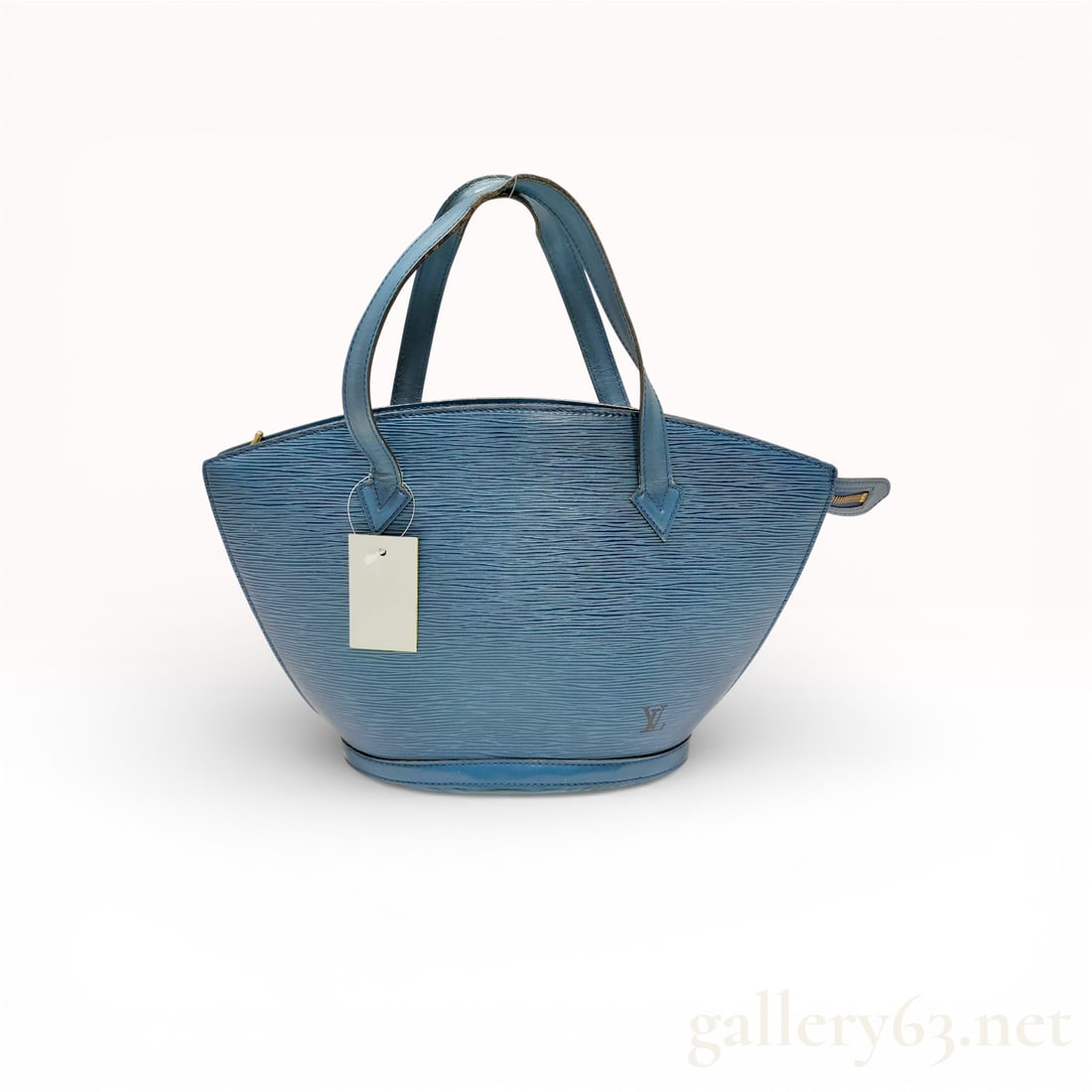 Louis Vuitton Saint Jacques Bag in Blue Epi Leather.: Authentic Louis Vuitton Saint Jacques bag in blue Epi leather, featuring a structured trapezoidal silhouette with signature horizontal texture. The design includes dual flat shoulder straps and gold t