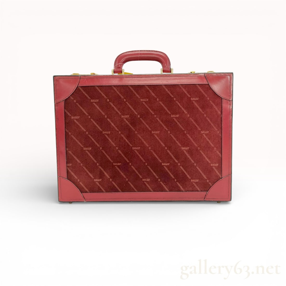 Bally Executive Red Leather Business Briefcase with Monogram Panel and Gold Hardware: Bally Red Leather Business Briefcase with Monogram Panel and Gold Hardware Description: Bally structured business briefcase crafted in red leather featuring a large front panel with diagonal Bal