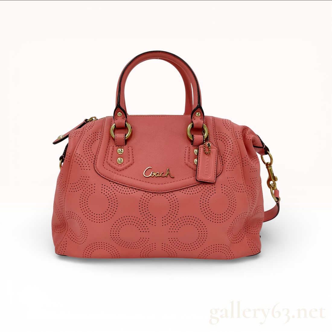 COACH Perforated Leather 2-Way Shoulder Bag Pink: Authentic COACH 2-way shoulder bag in soft pink perforated leather with gold-tone hardware. Features dual handles and a detachable shoulder strap for versatile wear. Light corner scuffing and small