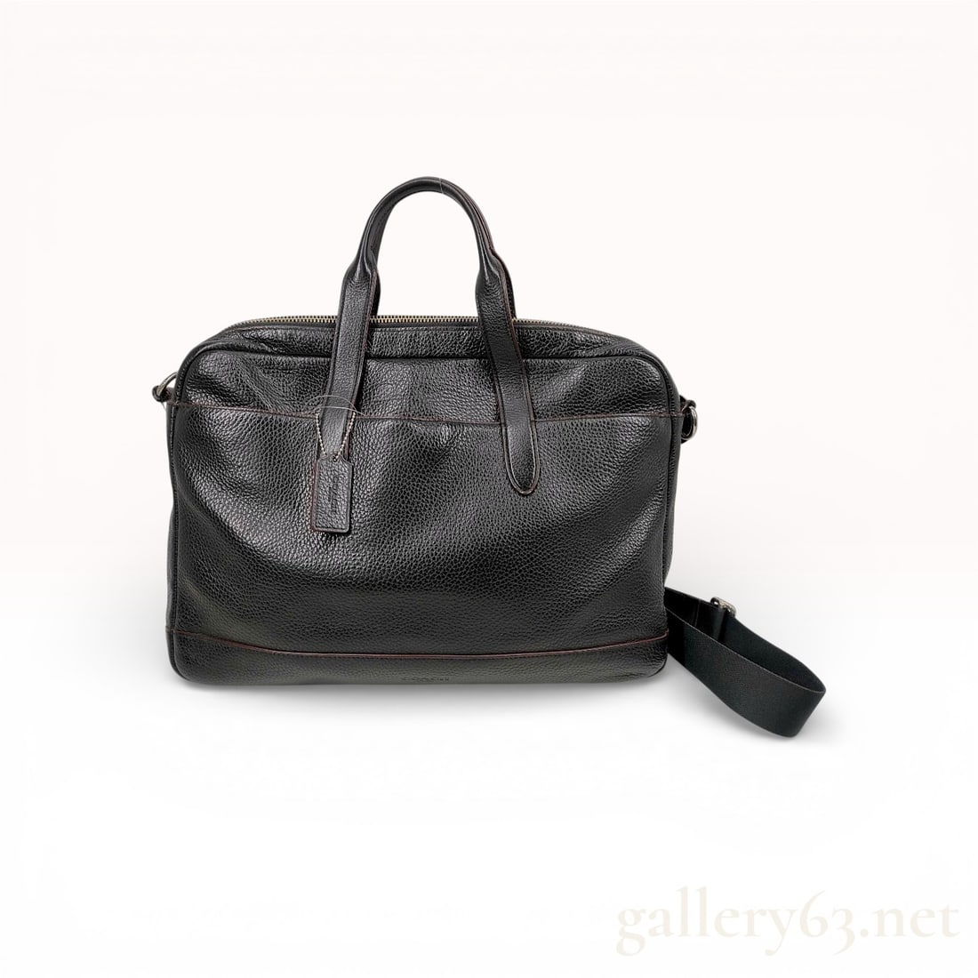 Coach Hamilton Pebbled Leather Briefcase, Black and Oxblood: This Coach Hamilton briefcase is crafted from premium black pebbled leather featuring smooth leather trim and distinctive oxblood edge-staining. The professional design includes dual rolled leather to