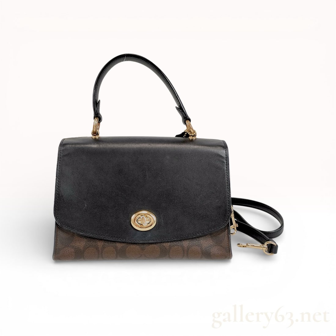 Coach Tilly Top Handle Satchel in Signature Canvas and Leather, Black and Brown: This Coach Tilly Top Handle Satchel is crafted from a combination of refined black leather and signature coated canvas in mahogany and brown. The bag features gold-tone hardware, including a signature