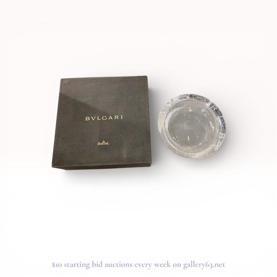 BVLGARI x Rosenthal Bvlgari Bvlgari Crystal Bowl: A sophisticated lead crystal vide poche or small decorative bowl from the prestigious collaboration between Italian luxury house BVLGARI and German master glassmaker Rosenthal. This piece features a c